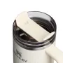Thermos mug with straw The Quencher H2.0 Fluted Tumbler 0.89L in glossy cream color